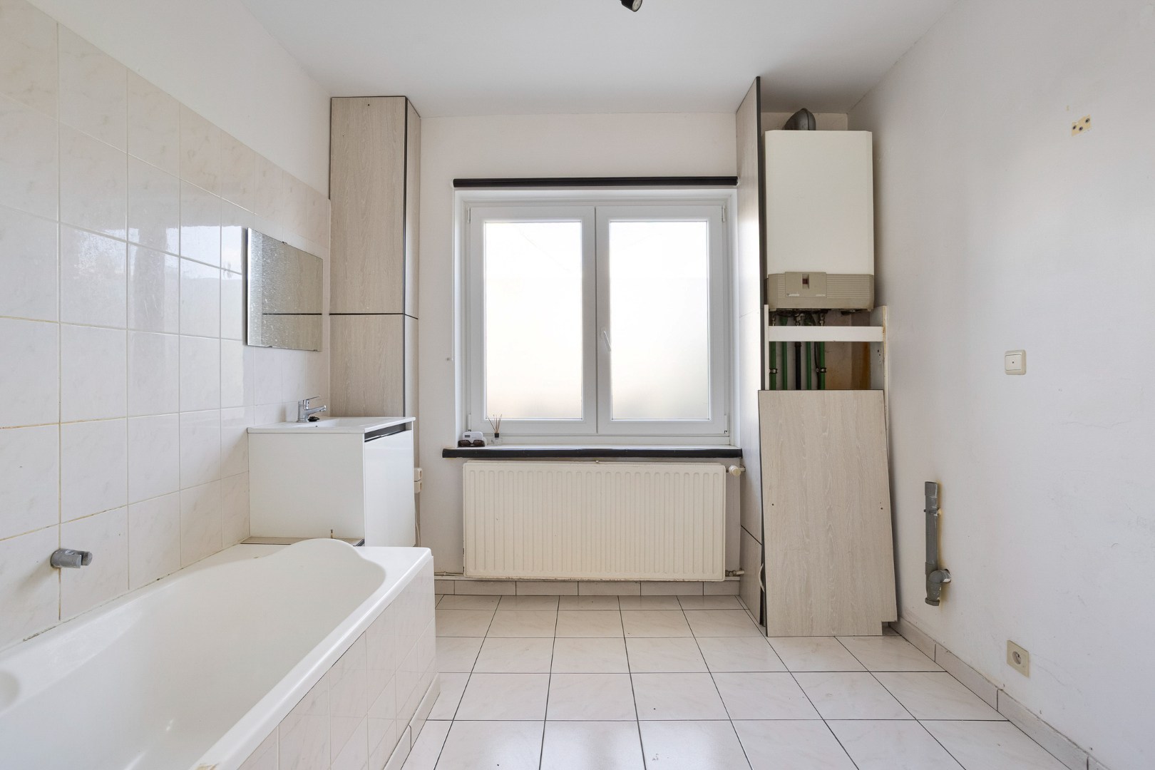 TE RENOVEREN WONING met 2 woonéénheden en tuin – 1640 SINT-GENESIUS-RODE 