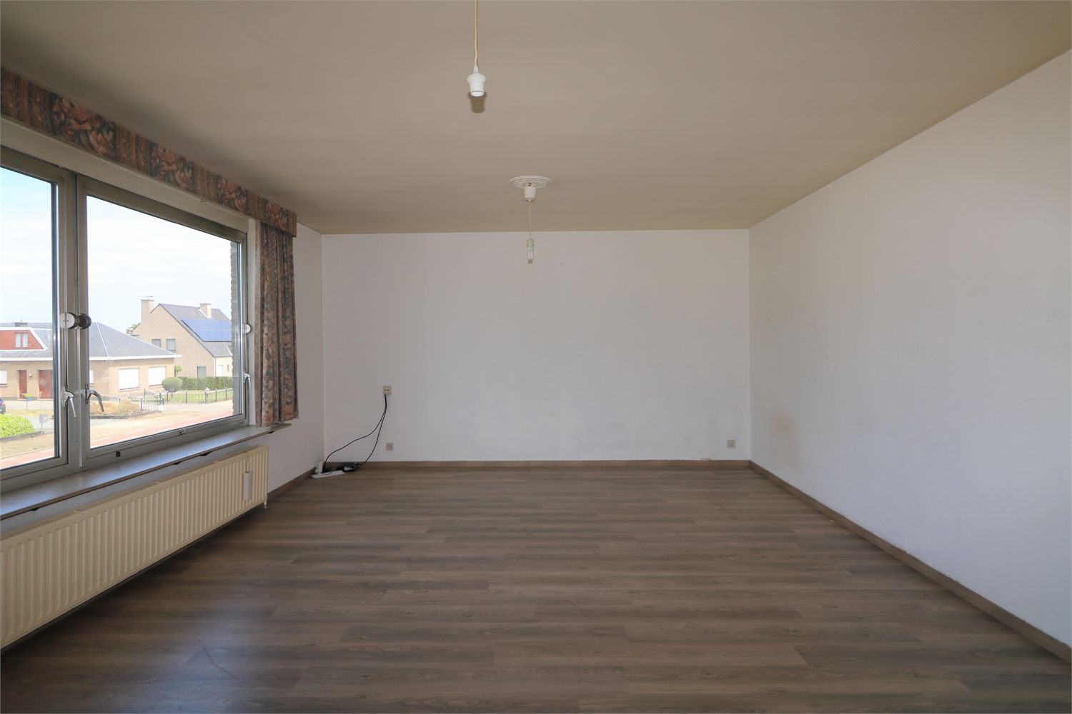 Licht en goed gelegen appartement te Sint-Niklaas incl. Garage 