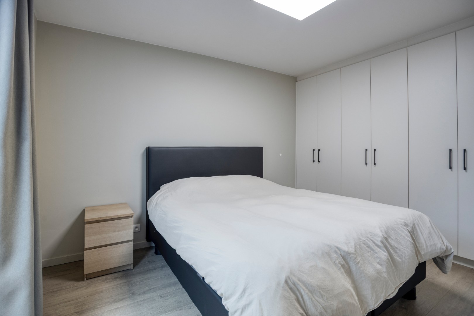 Energiezuinig en instapklaar gelijkvloers appartement met 2 slpk. en ruime tuin in het centrum van Geel 