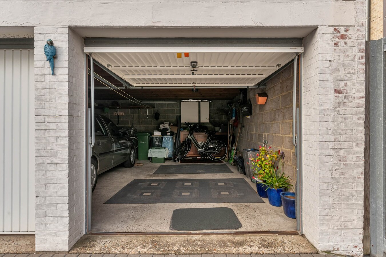 Comfortabel investeringsappartement met 2 slaapkamers en garage, in dorpskern 