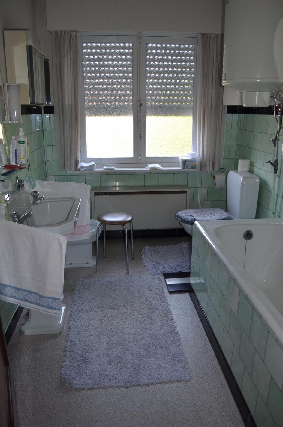 Open bebouwing met 3 slpks en garage te Adegem 