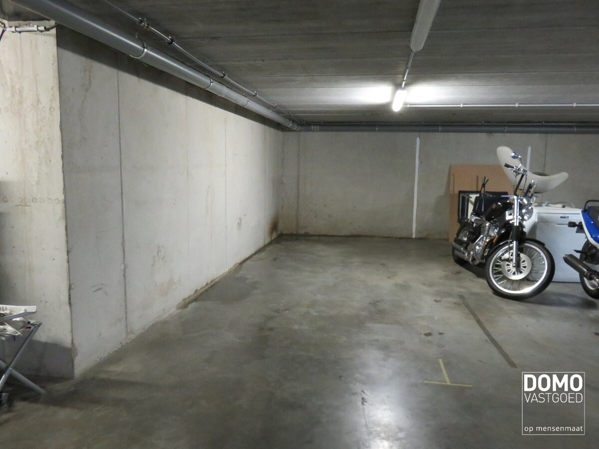 Gelijkvloers appartement met tuin en ondergrondse garage te Kermt - energielabel B -121m² bewoonbare oppervlakte 