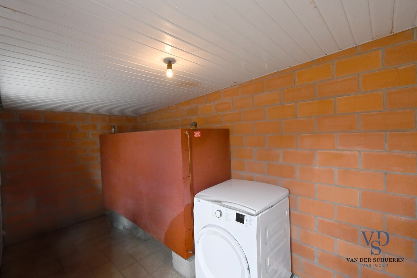 Half Open gezinswoning met potentieel 