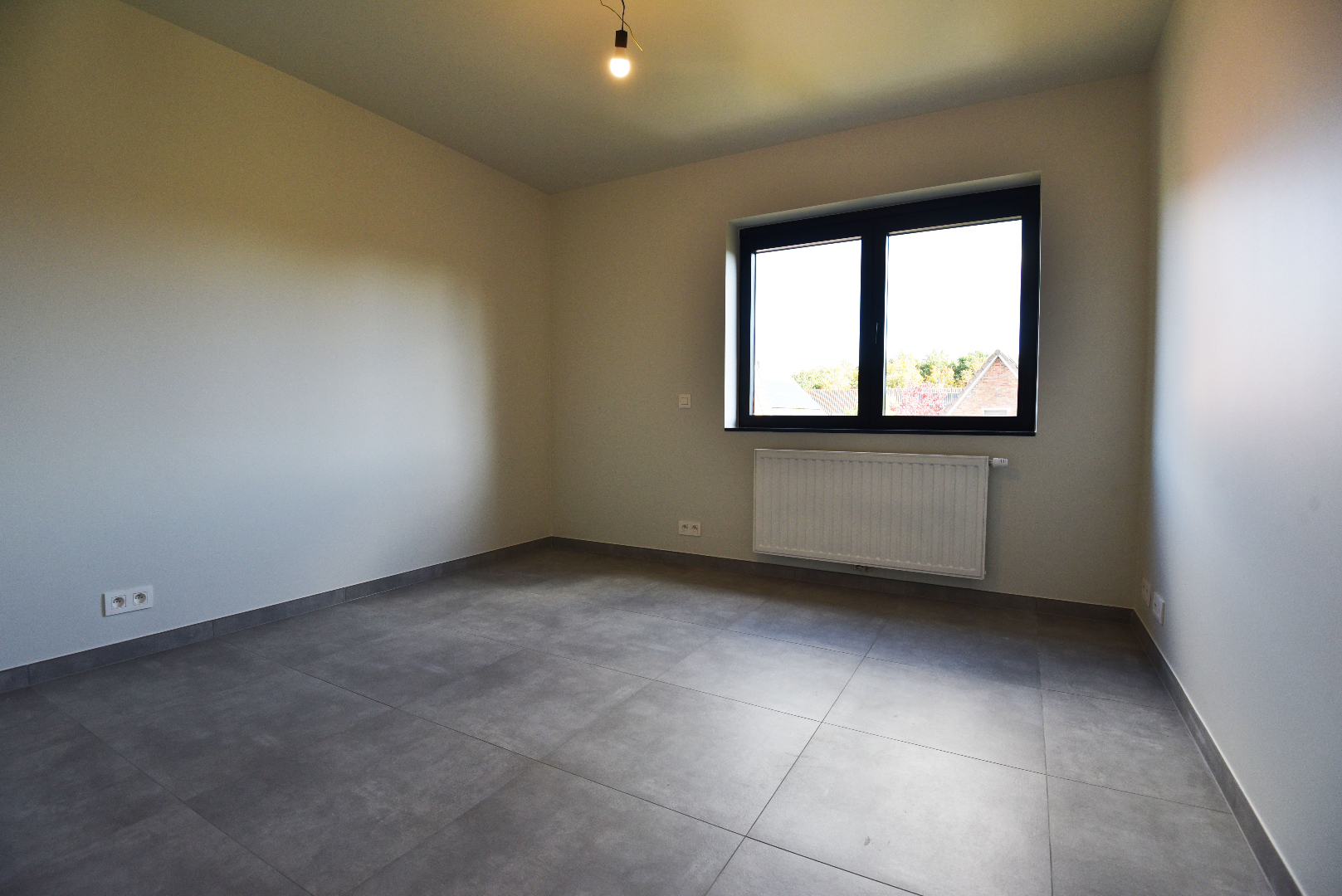 NIEUWBOUW open bebouwing (BEN-woning) met 3 slpks, carport, tuinhuis en tuin te Adegem 