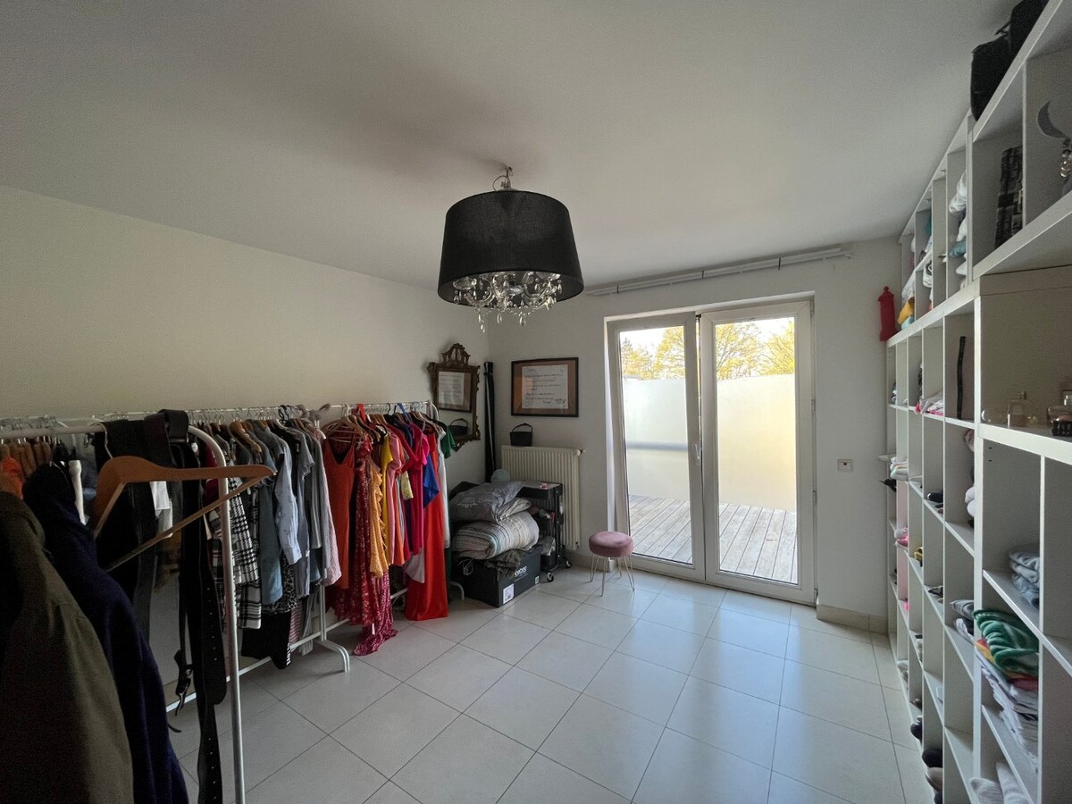 Tijdloos appartement met uitzonderlijk ruim terras 