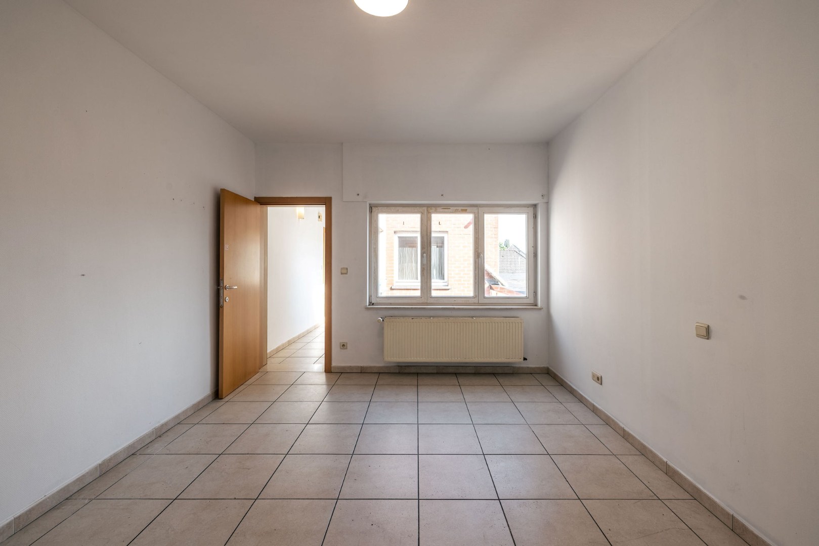 Lichtrijk en instapklaar wonen op de tweede verdieping nabij Gent 