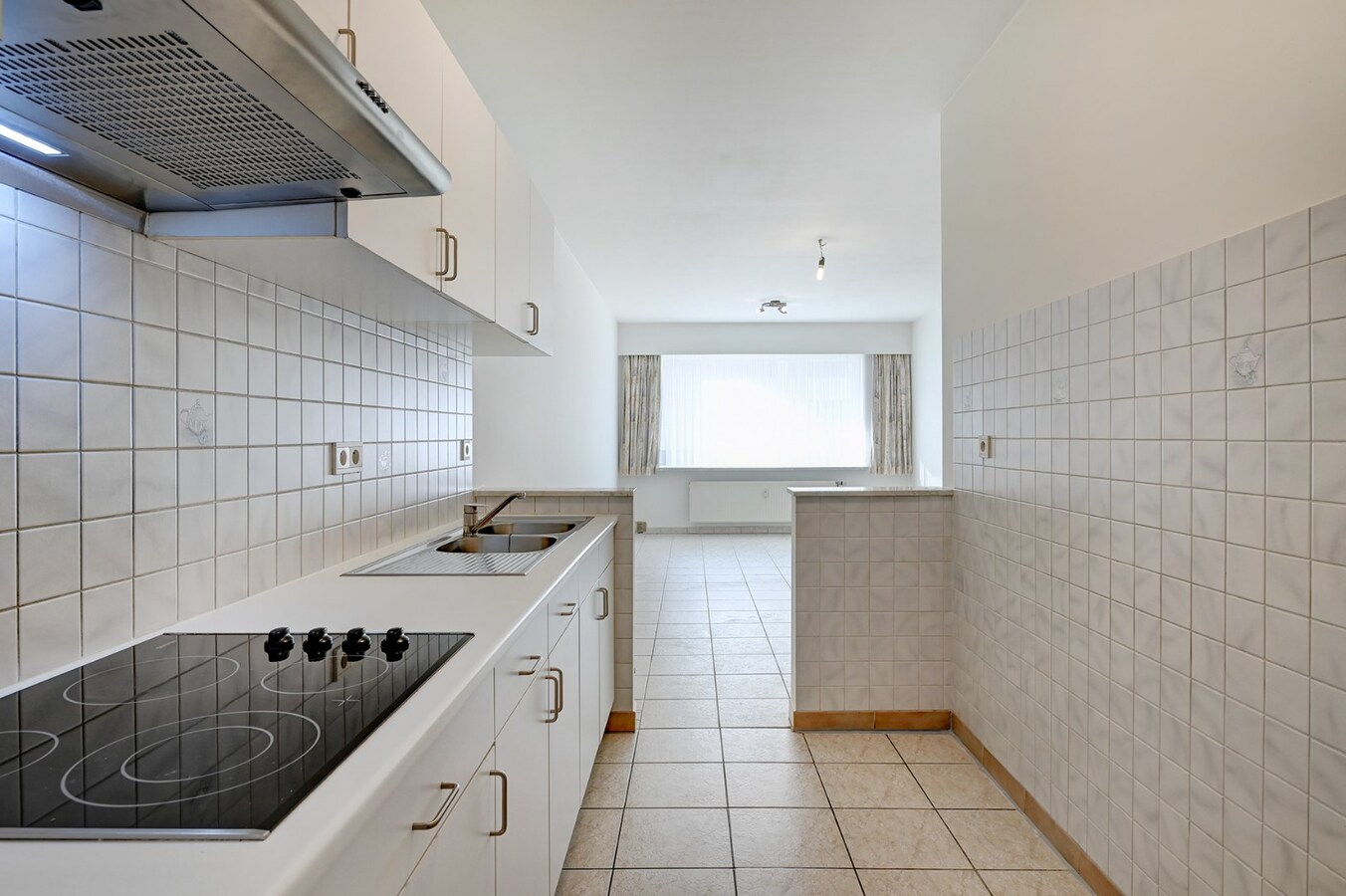 Centraal gelegen appartement met ondergrondse garage en groot terras 