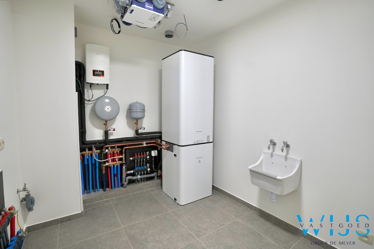 Drieslaapkamer appartement met garage in hartje Ertvelde ! 