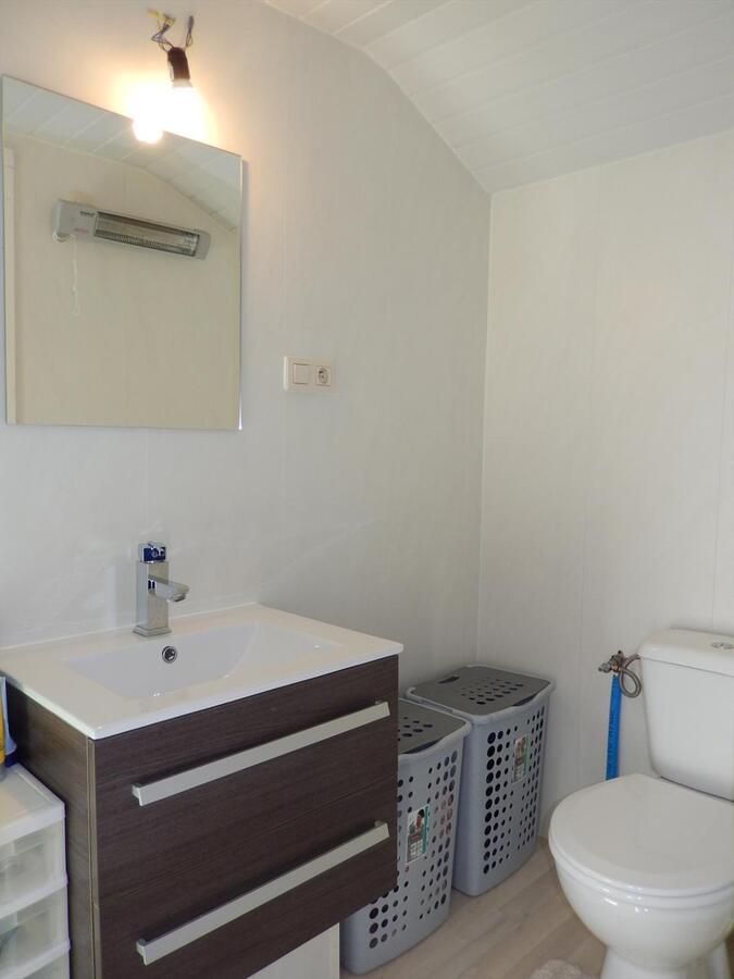 Gezellige instapklare rijwoning met koer 