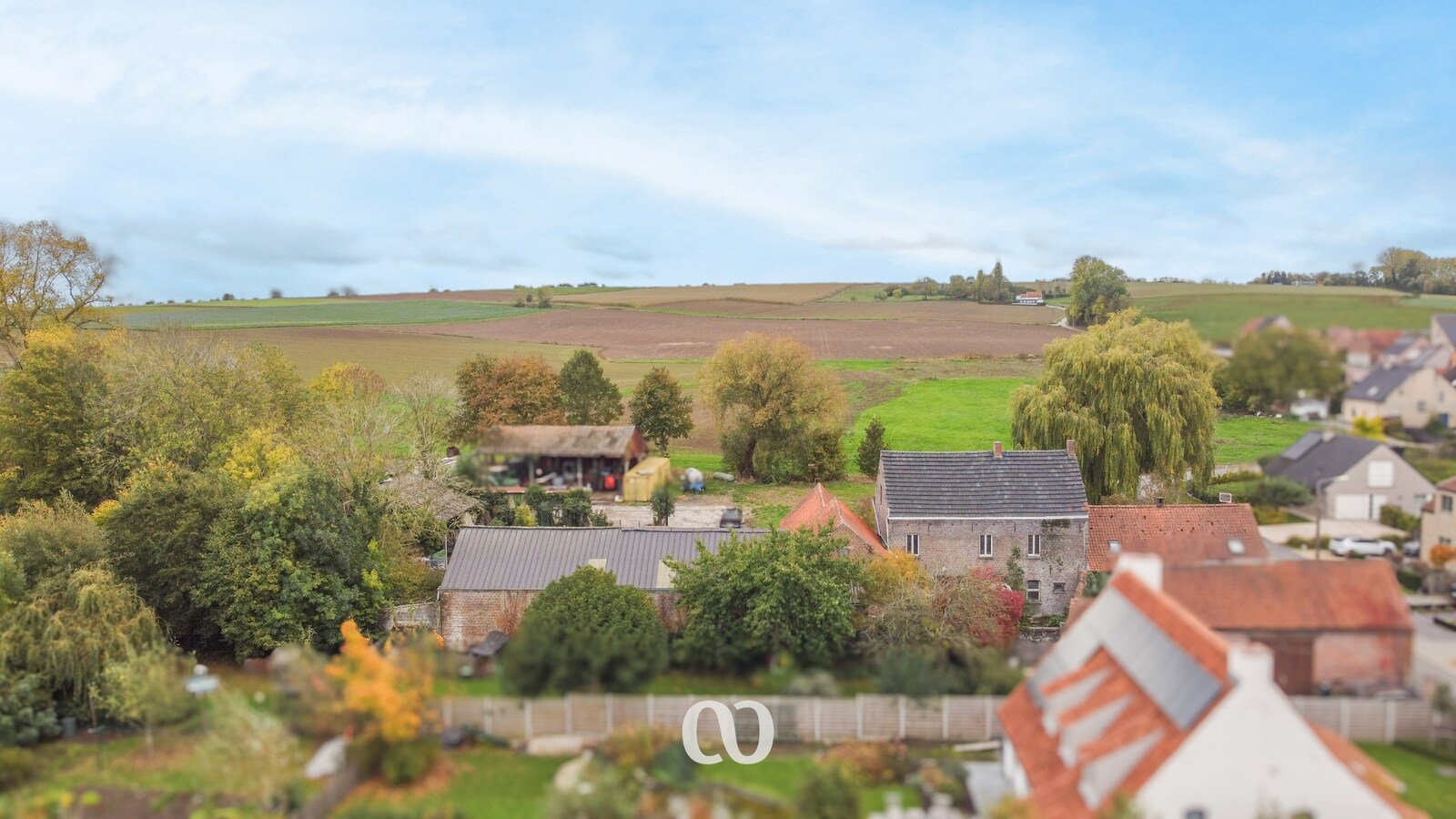 Pastorijwoning met tal van bijgebouwen 