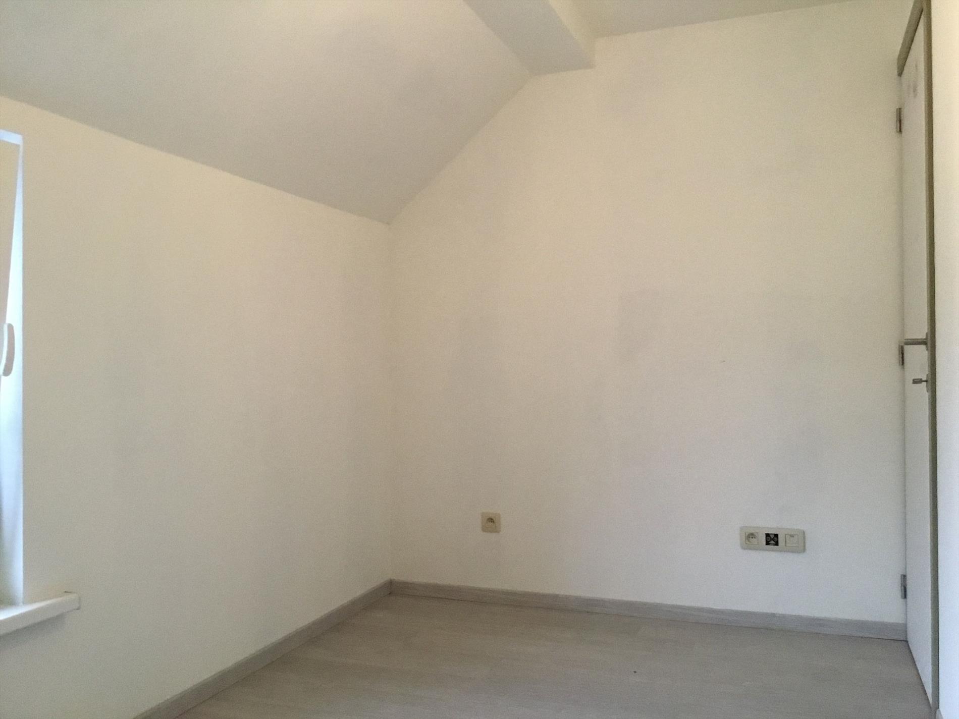 Instapklare eengezinswoning met aangelegde tuin in centrum Temse 