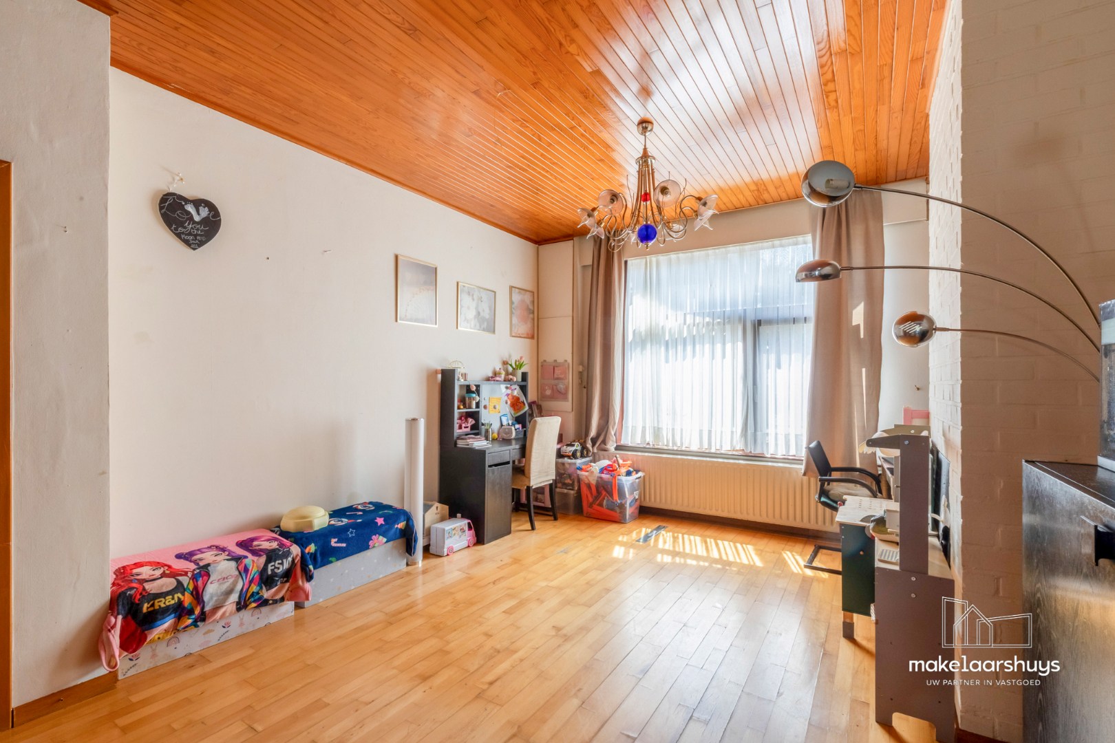 Ruime woning met 4 slpk en aangename tuin te Sint-Amandsberg 