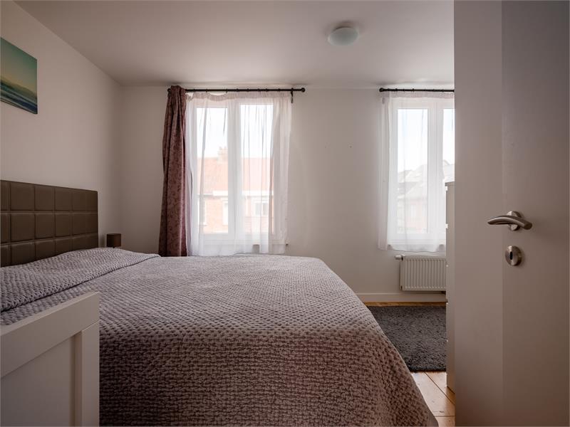 Instapklare hoekwoning met garage in groene rand van Gent 