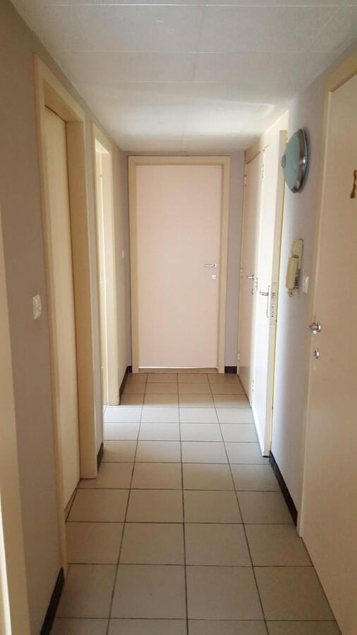 Instapklaar dakappartement met garagebox in Kuringen 