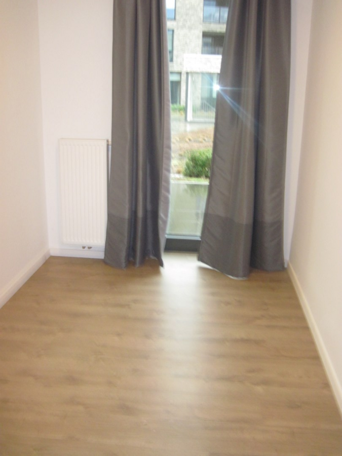 Gelijkvloers 2-slaapkamer appartement met uitzonderlijk terras. 