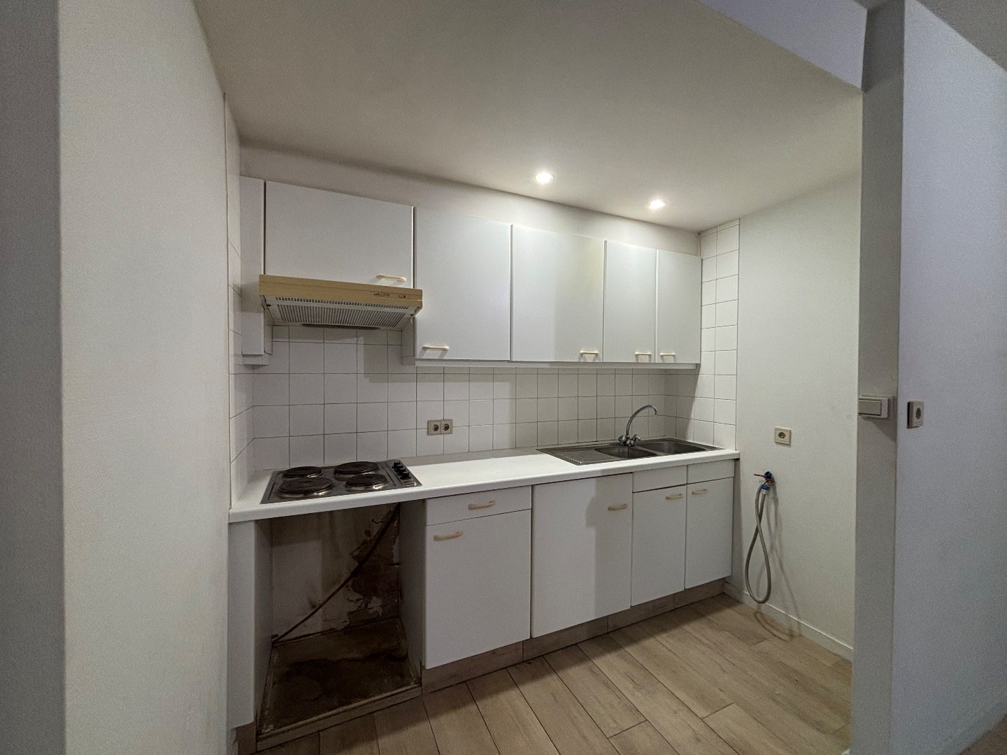 Opbrengsteigendom met 7 appartementen &amp; ruim handelspand in Mol-centrum 