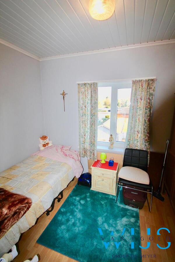 Praktische instapklare rijwoning gelegen in een rustige straat te Rieme! 