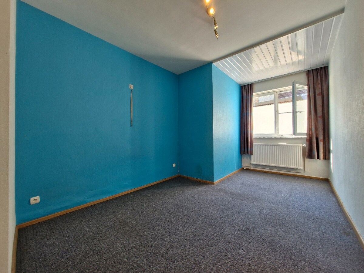 Charmant gelijkvloers appartement met stadskoer in hartje Heist 