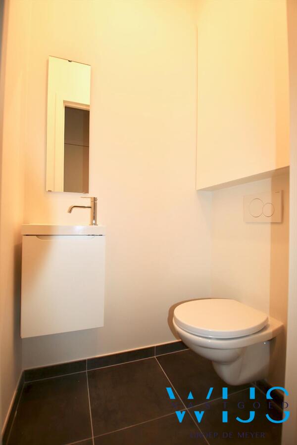 Gelijkvloers appartement met TUIN &amp; GARAGE te Zelzate! 