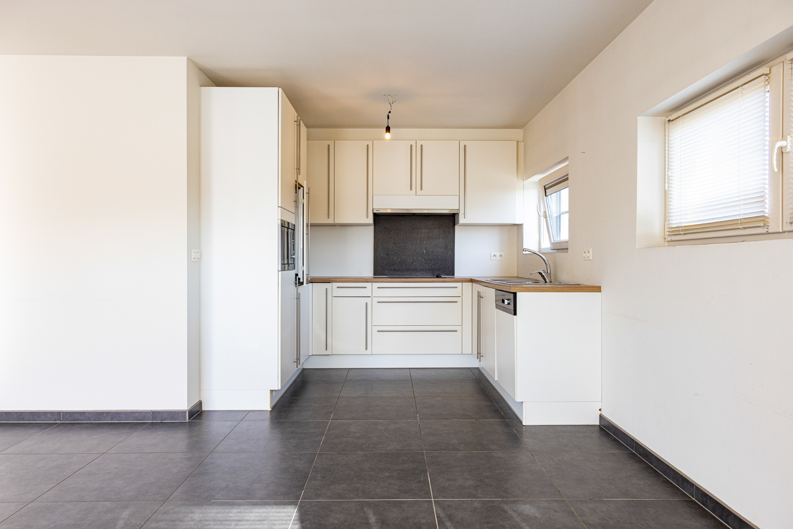 Duplex app. 142 m² met 3 slpks, terras en 2 autostandplaatsen te Maldegem 