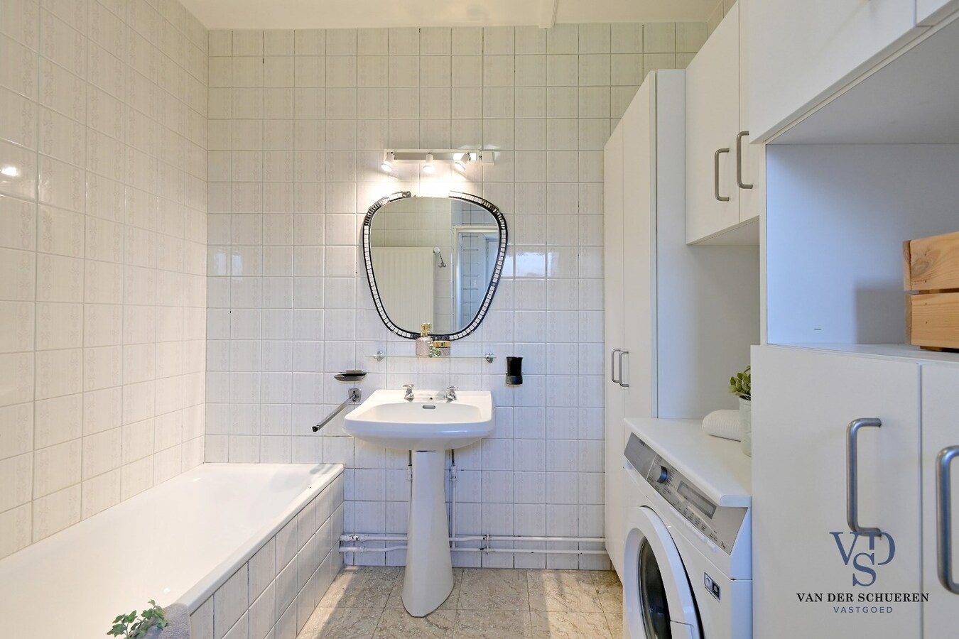 Half Open gezinswoning met potentieel 