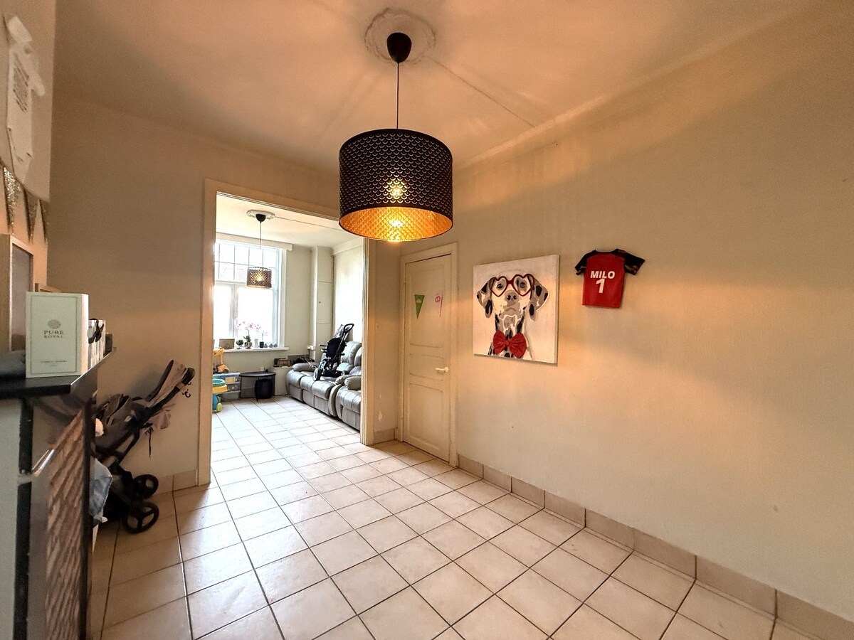 Twee woningen met totaal 5 slaapkamers en tuin te centrum Roeselare 