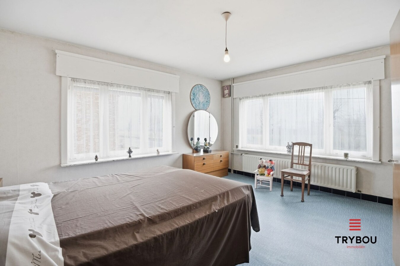 Woning met ruimte en veel mogelijkheden te koop in Zarren! 