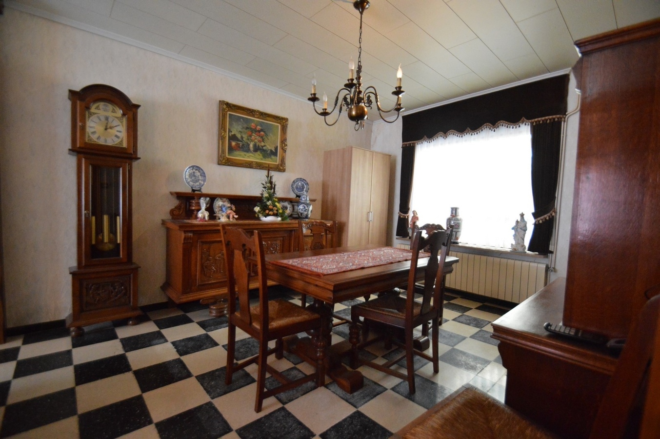 Te renoveren hoekwoning met garage - Heist 