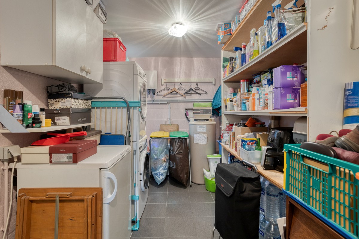 Instapklare halfopen bebouwing met 3 slaapkamers, tuin, terras en 2 carports in Kessel-Lo! – EPC 166 kWh/m² - bewoonbare opp. 146 m² 