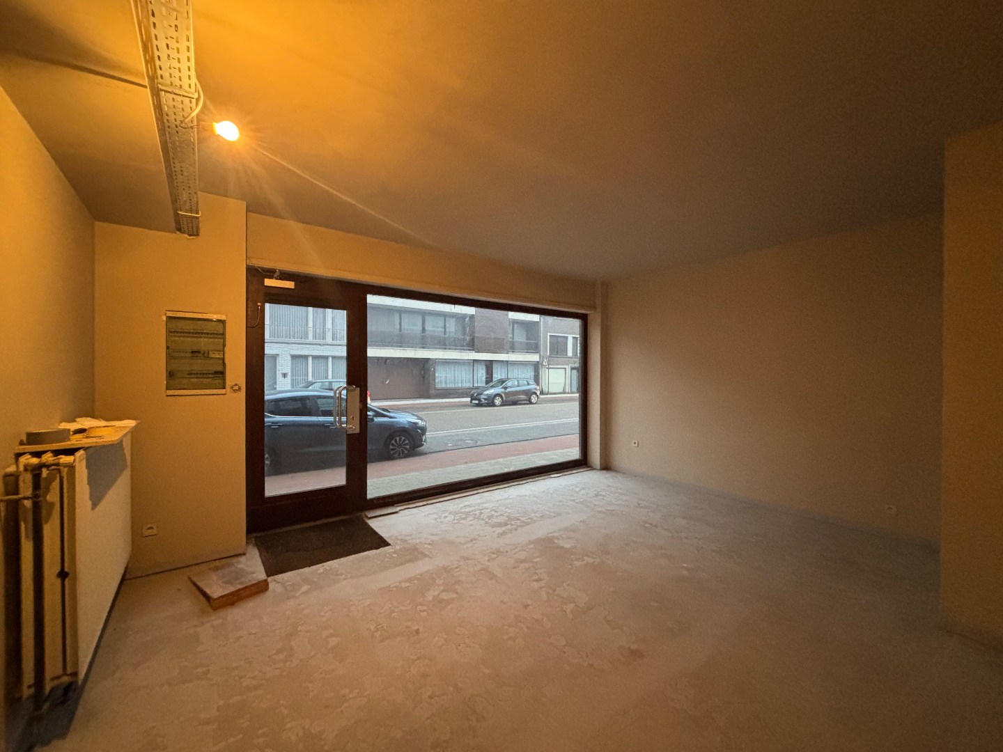 Opbrengsteigendom met 7 appartementen &amp; ruim handelspand in Mol-centrum 