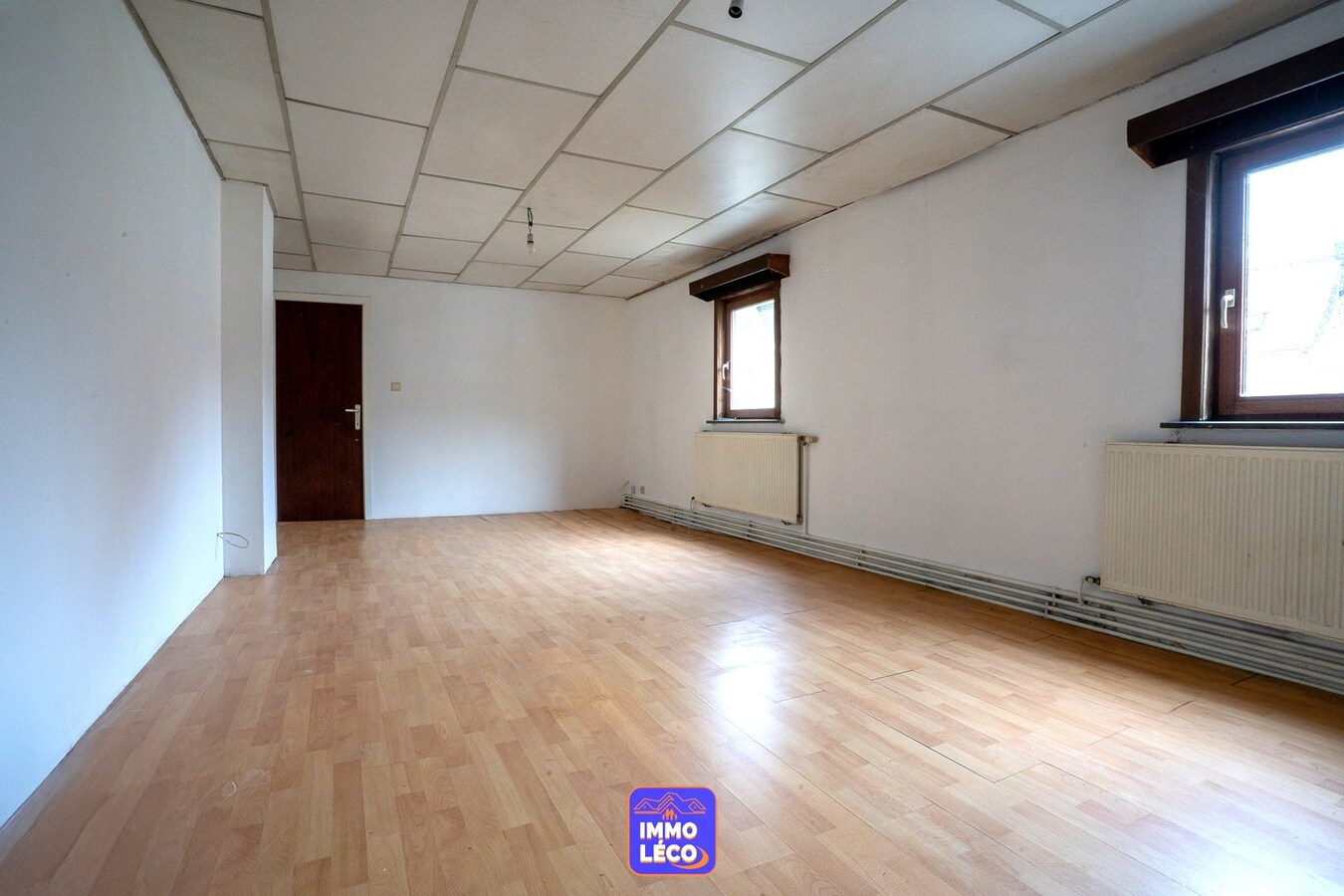 Maison de commerce avec habitation et jardin, en plein centre-ville, très beaux volumes ! 