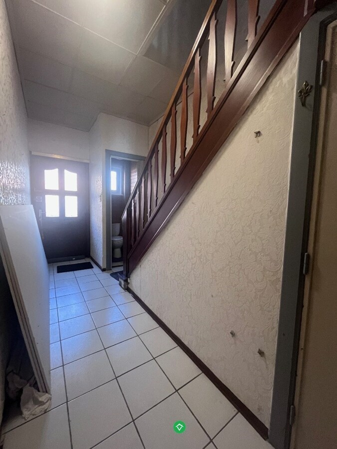 Comfortabel, op te knappen woonhuis met zonnige tuin, welgelegen in rustige buurt. 