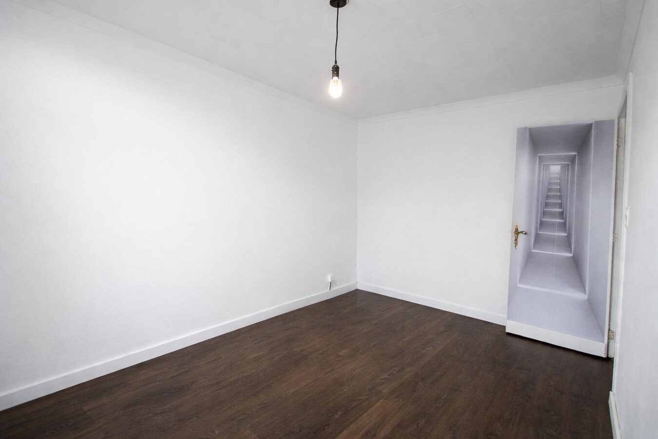 Centraal gelegen woning met drie slaapkamers, tuin én inpandige garage te koop in Sint-Niklaas! 