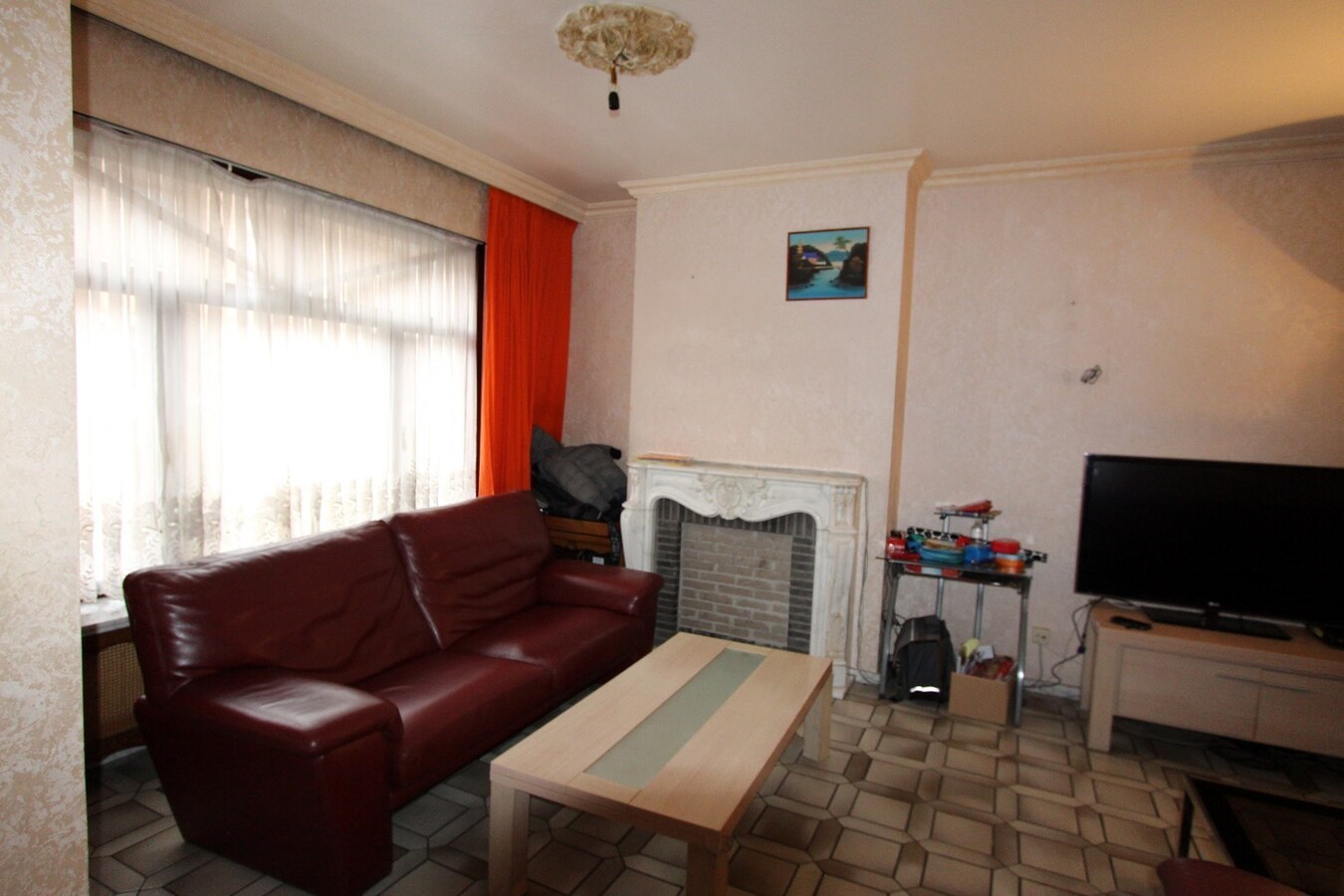 Woning met 3 slaapkamers en garage te centrum Roeselare 