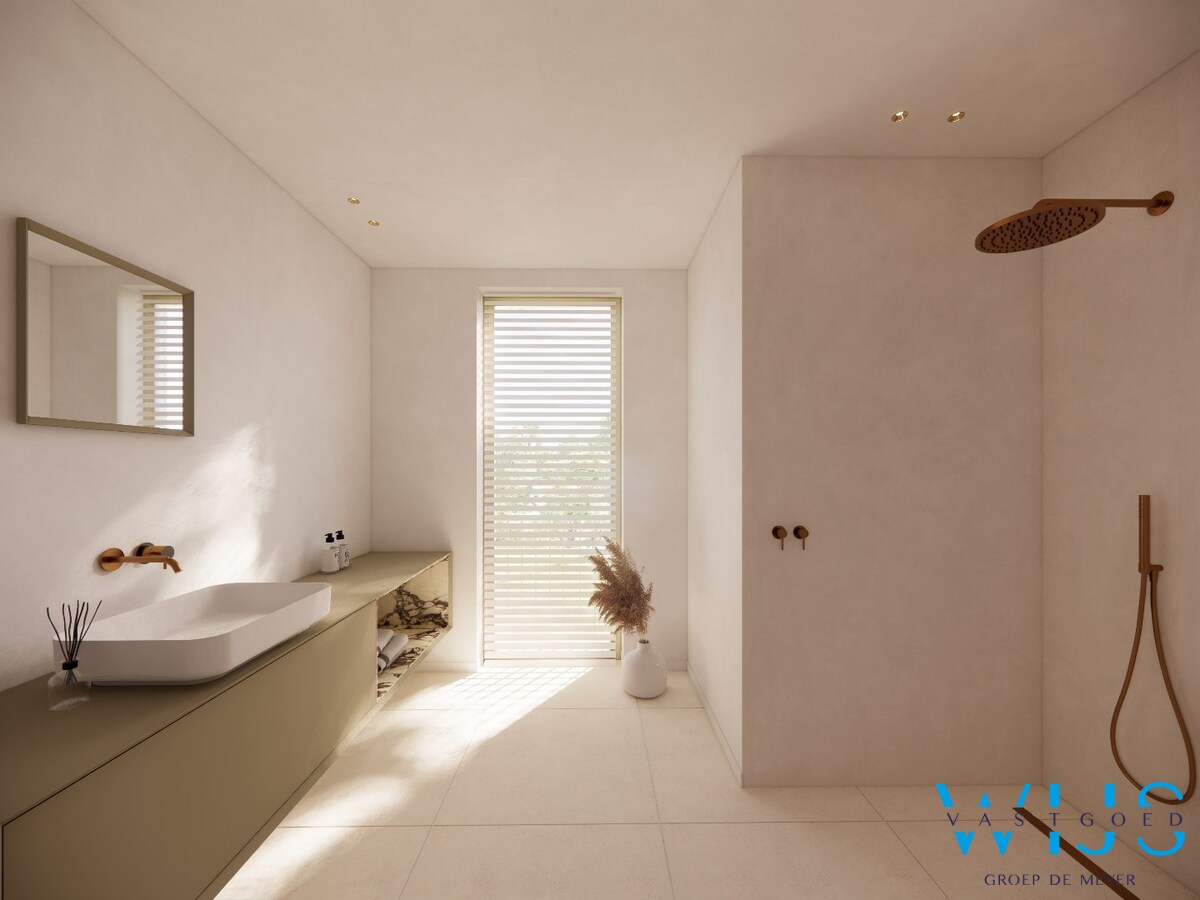 Handelspand in nieuwbouwproject op zichtrijke locatie in Ertvelde! 