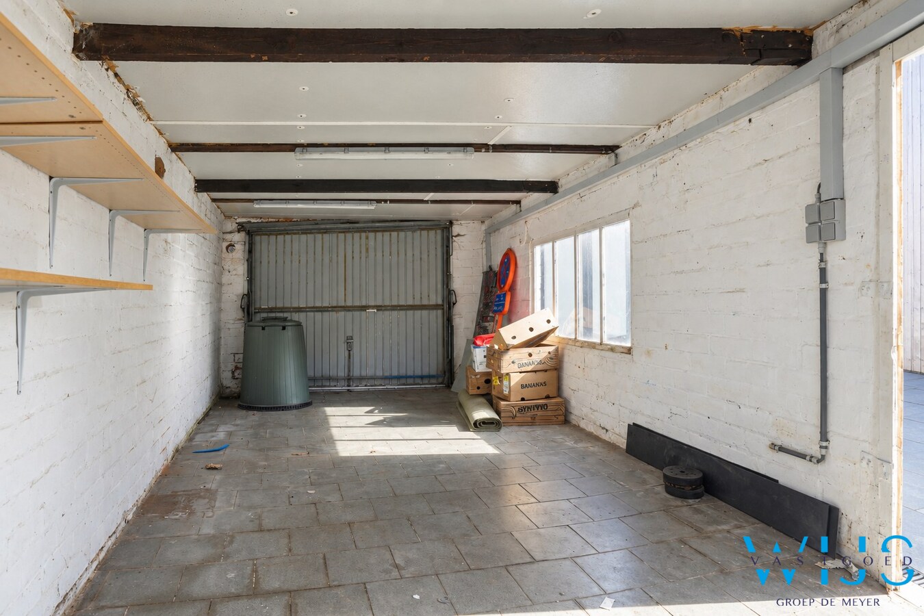 Gerenoveerde woning met diepe tuin en garage in Zelzate 