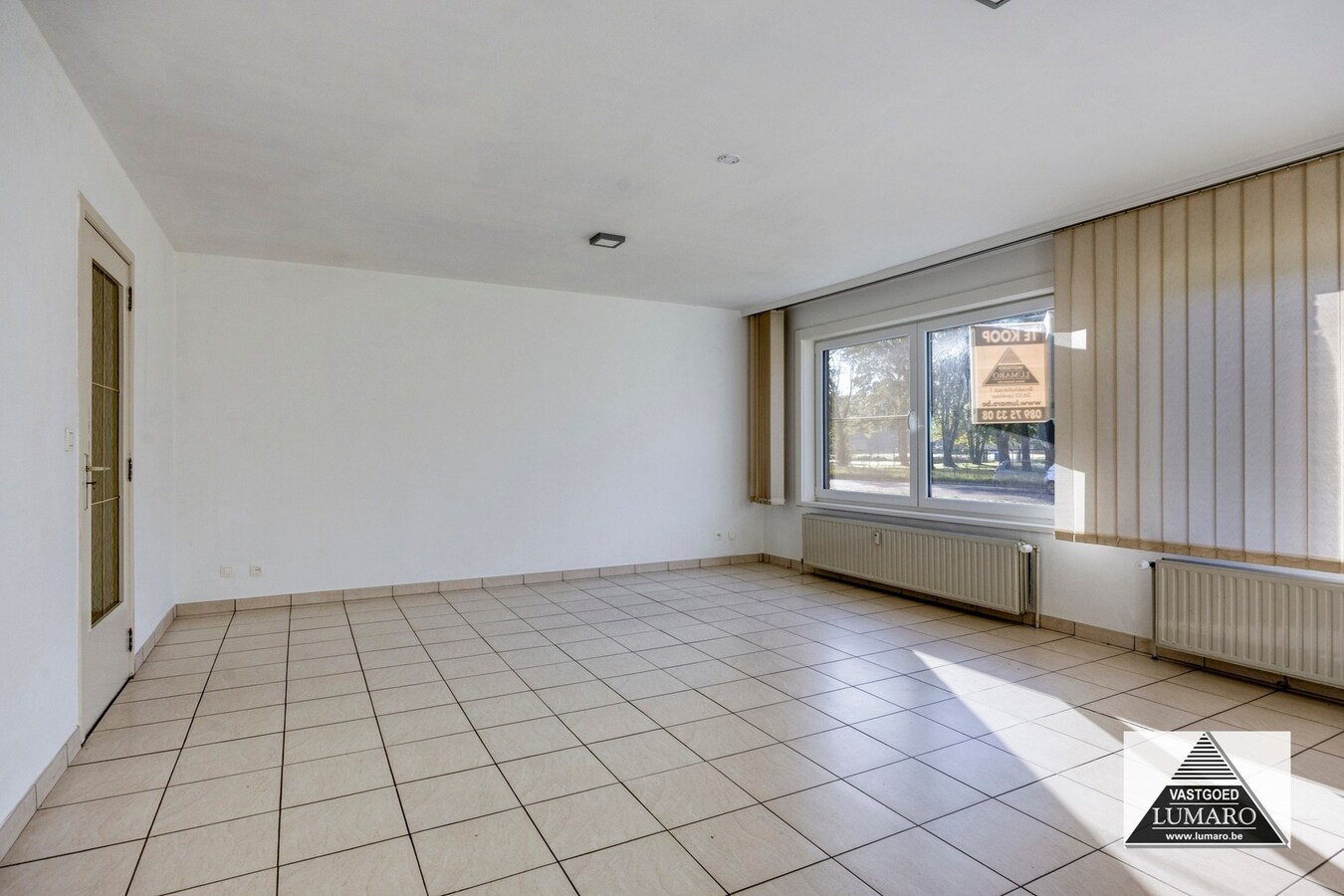 Gelijkvloers appartement met 3 slaapkamers, en ruime garage 