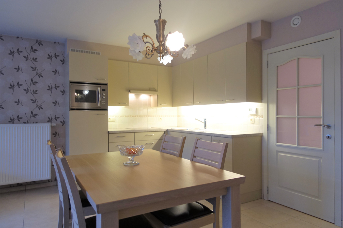 Gelijkvloers appartement met tuin en garage 