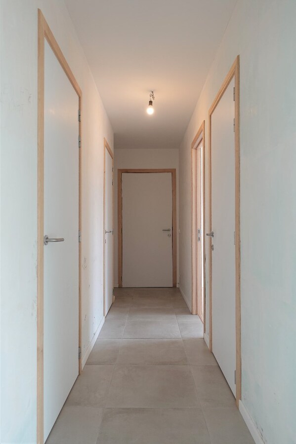 Nieuwbouwappartement met terras en tuin 