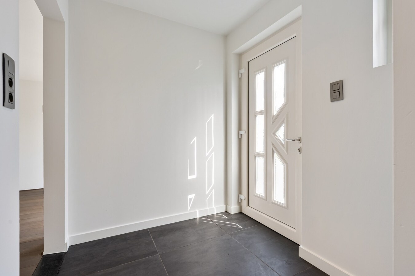 Gezellige, instapklare stadswoning in het centrum van Maaseik grenzend aan de groene wal! 