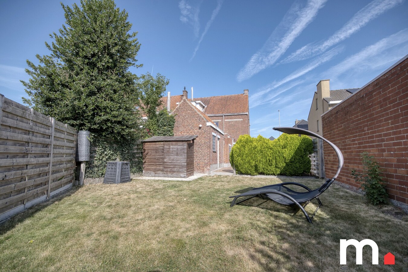 Kloeke half open bebouwing in Desselgem met tuin, terras en garage . 
