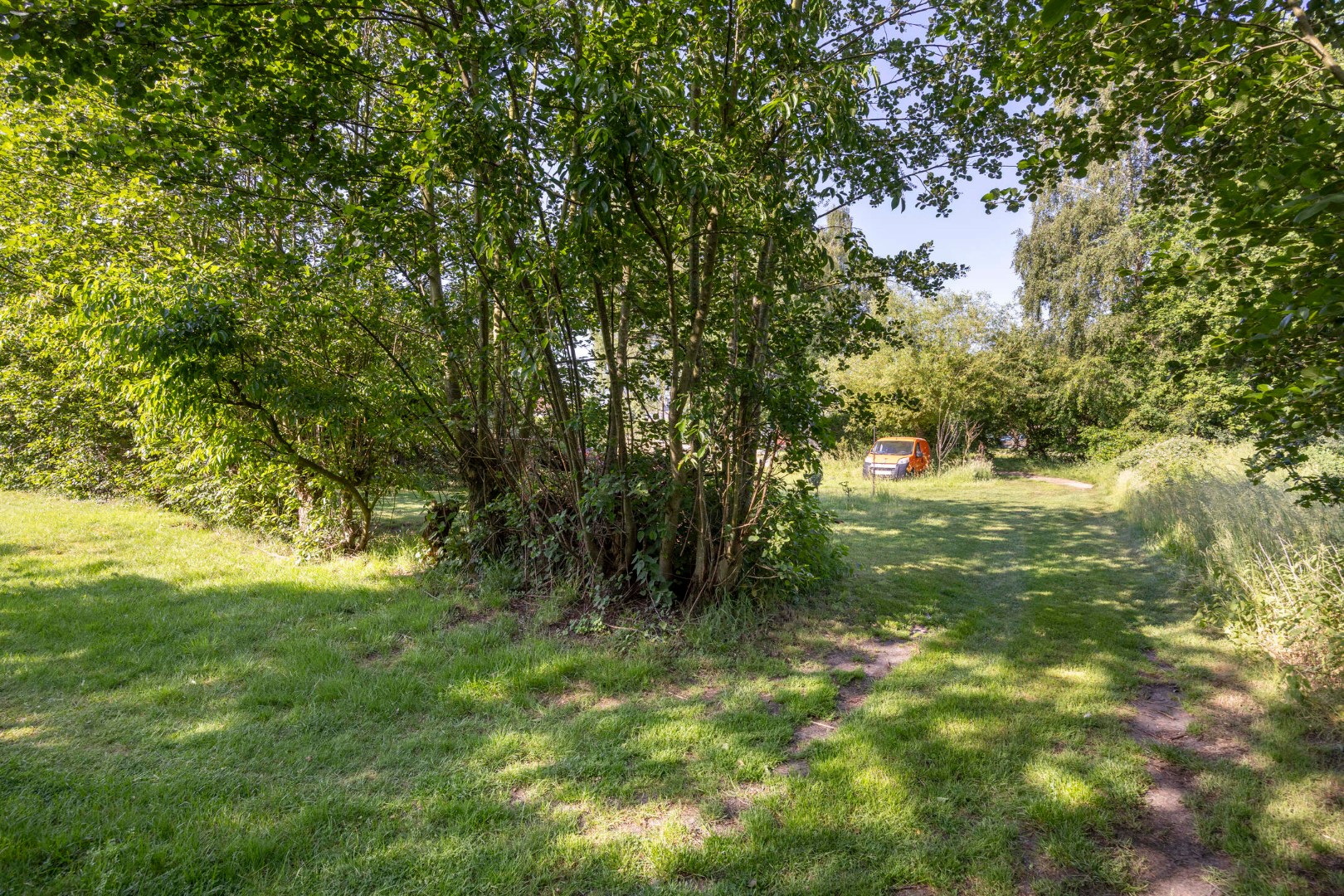 Halfopen bebouwing met 3 slpk., ruime tuin en garage in Mol 