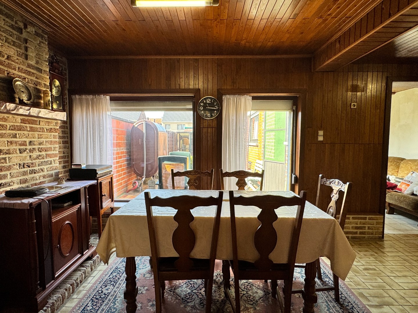 Gezellige woning met stadstuin, garage en uitweg langsachter. 