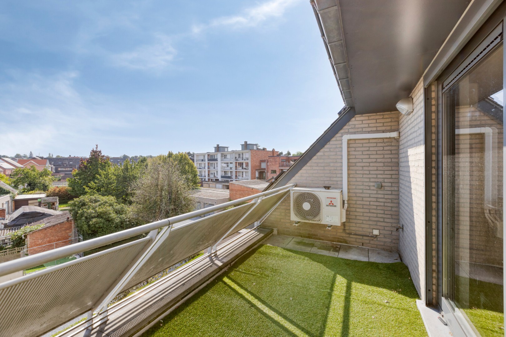 Energiezuinig dakappartement met 1 slpk. in het hart van Tessenderlo 