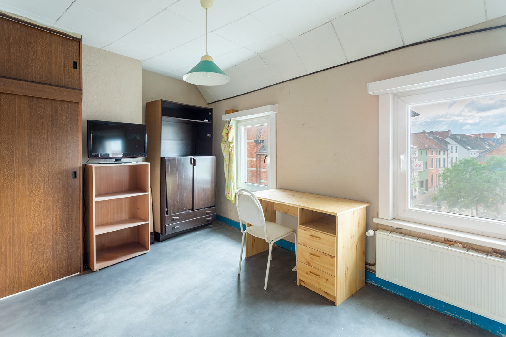 Unieke renovatiewoning met karakter en potentieel in hartje Ledeberg 