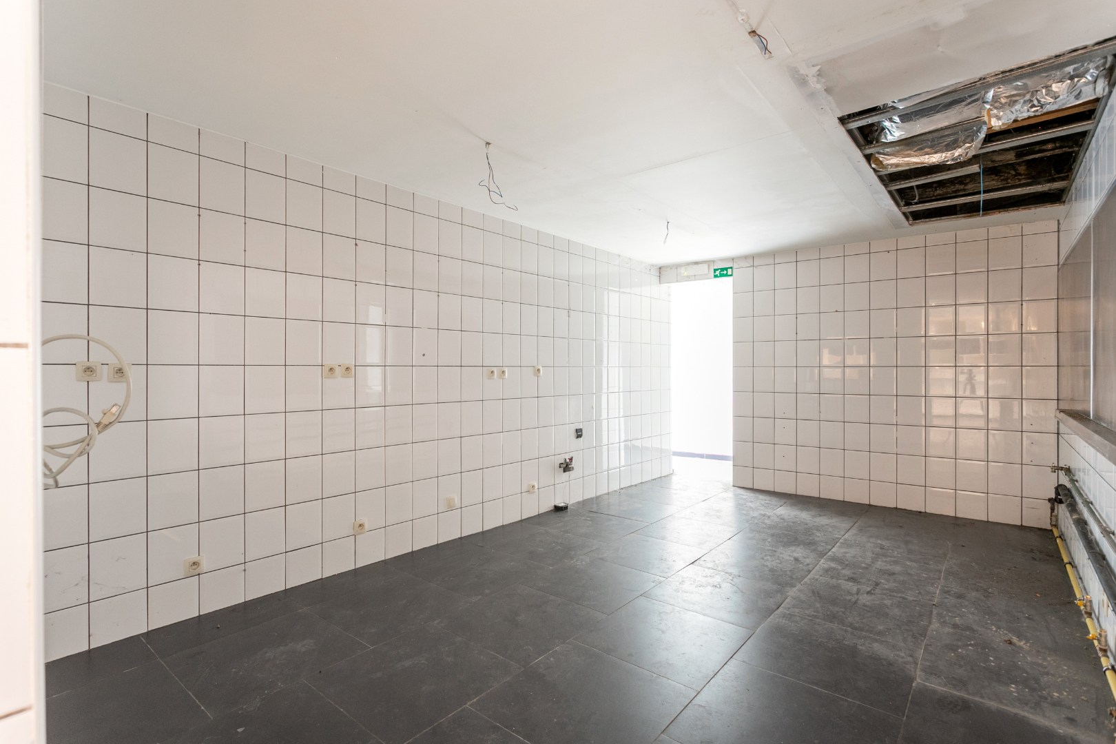 Handelsruimte met woonst op een gunstige ligging 