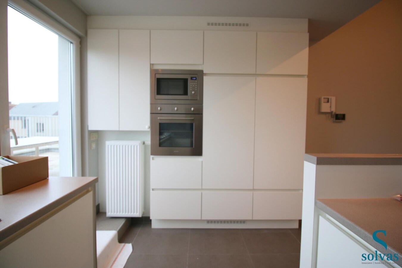 Appartement met 2 garageboxen 