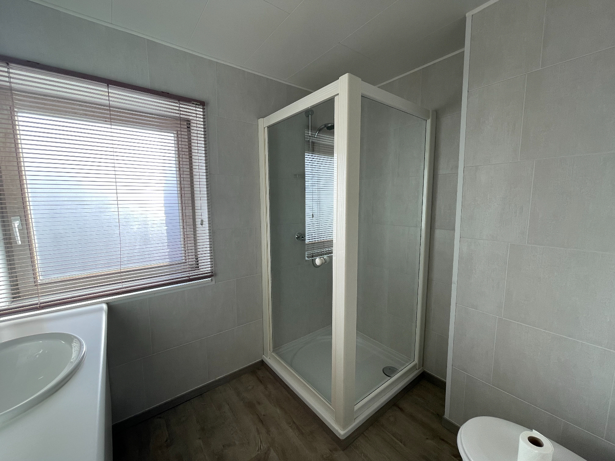 Rijwoning met 2 slaapkamers en tuin te Roeselare 