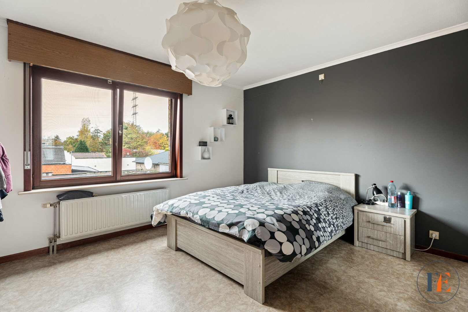 Huis met inpandige garage, tuin en  atelier te Wondelgem 