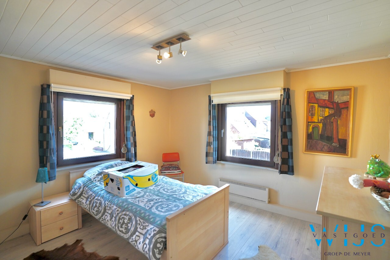Praktisch en rustig gelegen woning met garage &amp; toffe tuin te Zelzate! 